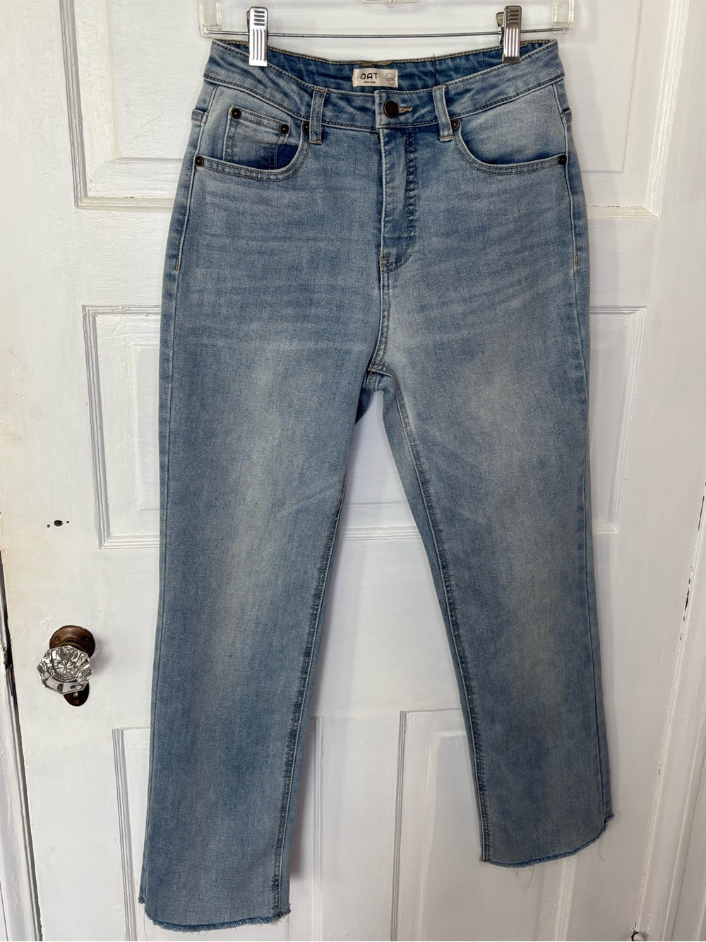 Oat New York Light Wash High-Rise Straight Leg Jeans With Fringe Hem